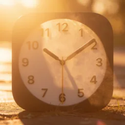 Clock icon in the Sunset style for macOS